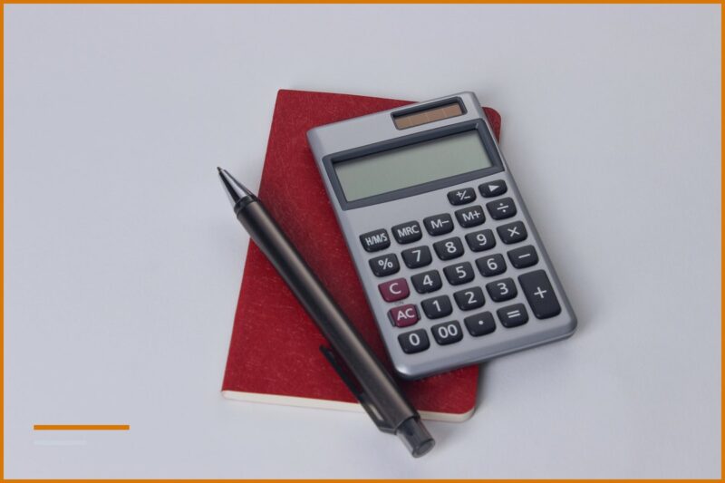 Personal income tax for individuals, calculator and notepad on the table